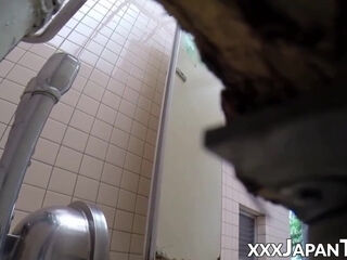 caught Oriental hottie peeing in public toilet