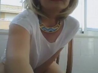 Cute short haired mature blonde lady was working on webcam a bit