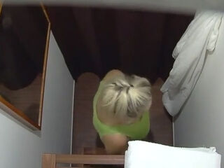 Busty mature blonde in a massage parlor