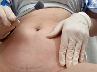 I play with medical gloves belly button