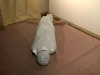Japanese doll mummified added to endear gagged