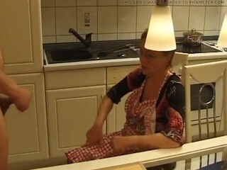 Mature German Domina plays with horny stud