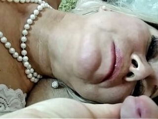 Mature sexy lady with a cock in her mouth!