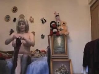 Ash-blonde mature buxom woman dressing up on covert webcam vid