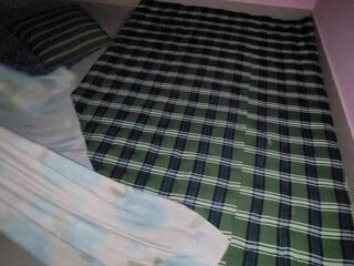 My stepsister is getting the bed ready for her husband.